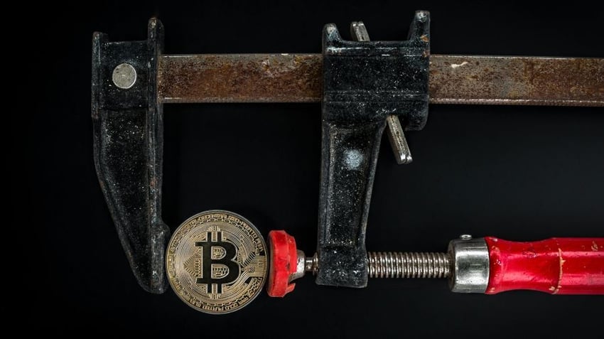 Hammer and wrench connected by Bitcoin